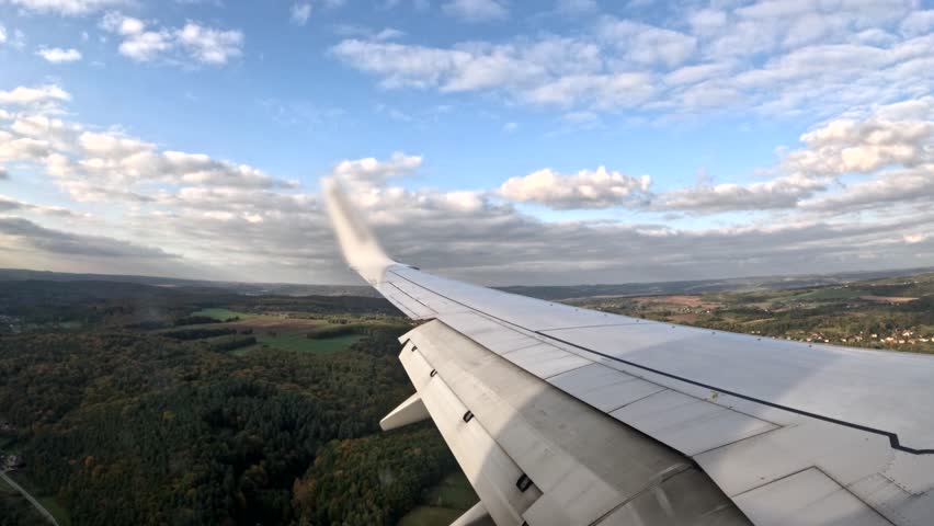 Airplane Landing View From Window at Krakow Airport Poland