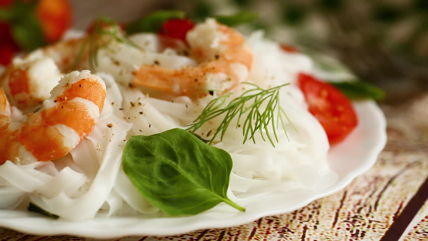 simple seafood dinner, rice noodles with shrimp, close up
