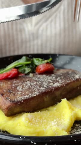 tongue with mashed potatoes Juicy grilled meat served with creamy mashed potatoes ketchup and coleslaw