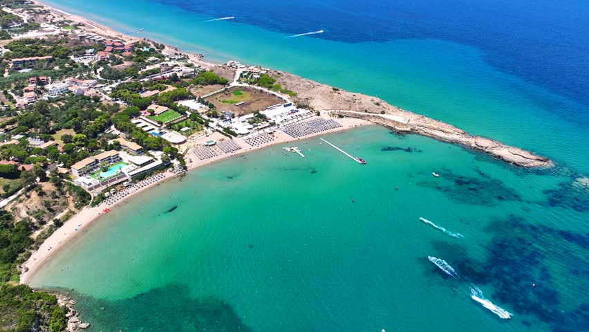 Aerial drone cinematic video of famous sandy beach of Agios Nikolaos in south east area of Zakinthos island, Ionian Sea, Greece