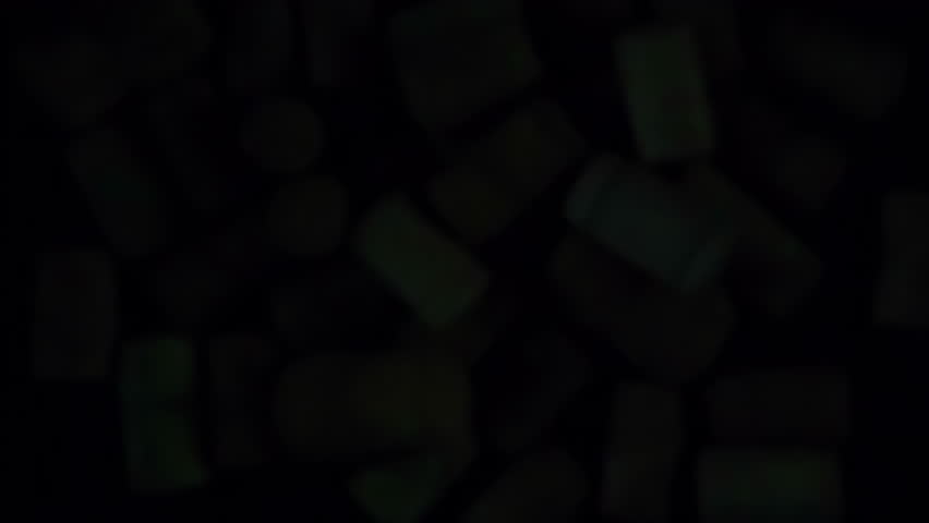 Soaring Wine Corks. Wine corks in large quantity in the air slowly stuck on a black background