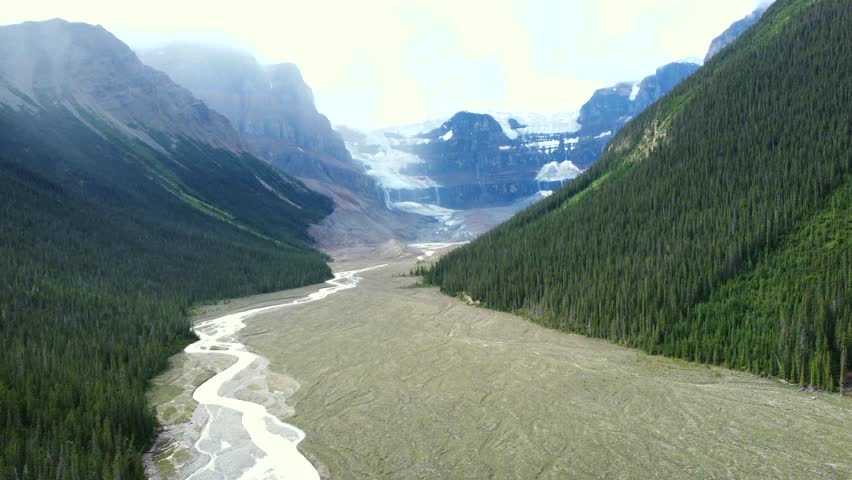 Sunwapta river flowing from athabasca glacier in jasper national park, alberta, canada, showing the effects of global warming and climate change