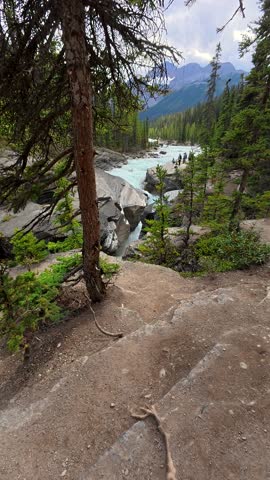 Panning view revealing mistaya canyon