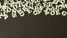 A person spelling Diet Plan with plastic letters