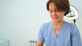 Portrait of young Caucasian masseur with towels in spa salon - Powered by Shutterstock - Get 15% off with code: PIKWIZARD15