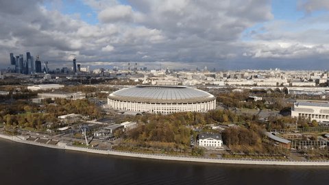 Sideways Drone Flight over City Stadium River