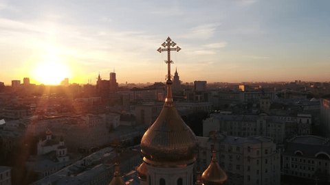 Drone Orbiting Church Dome Cross Sunset