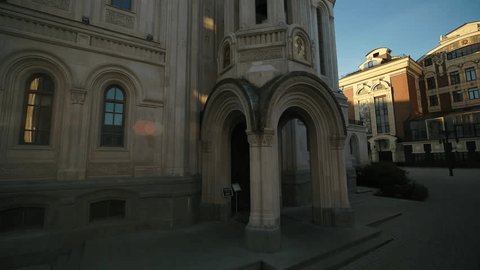 Drone Ascending near Church Entrance Orbiting