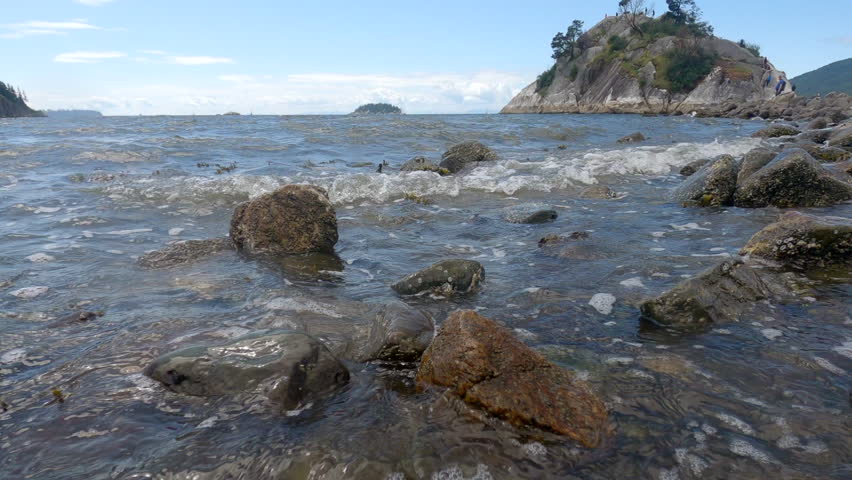 Whytecliff Park Summer Shoreline Low Tide 4K UHD.Whytecliff Park and Whyte Islet connected to shore at low tide. West Vancouver, British Columbia, Canada. 4K, UHD.
