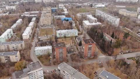 Descending Drone Shot over City Apartments toward