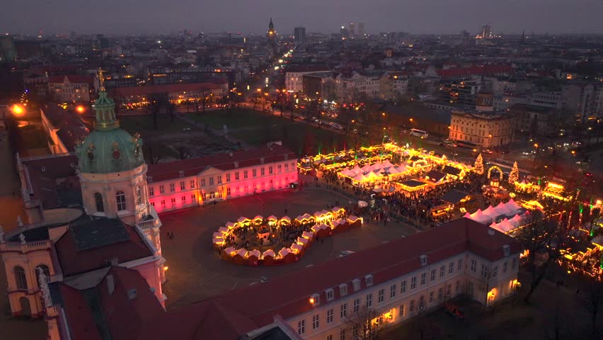 Weihnachtsmarkt Aerial View at Winter Night. Illuminated Christmas market at Charlottenburg Palace in Berlin, Germany