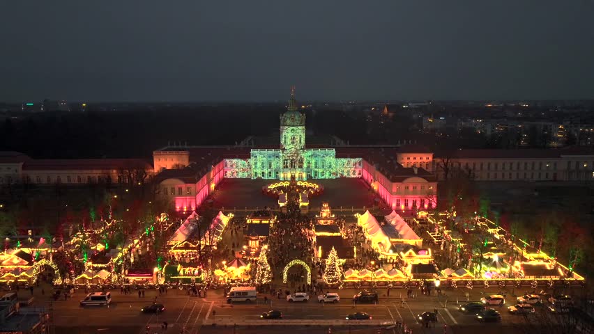 Weihnachtsmarkt Aerial View at Winter Night. Illuminated Christmas market at Charlottenburg Palace in Berlin, Germany
