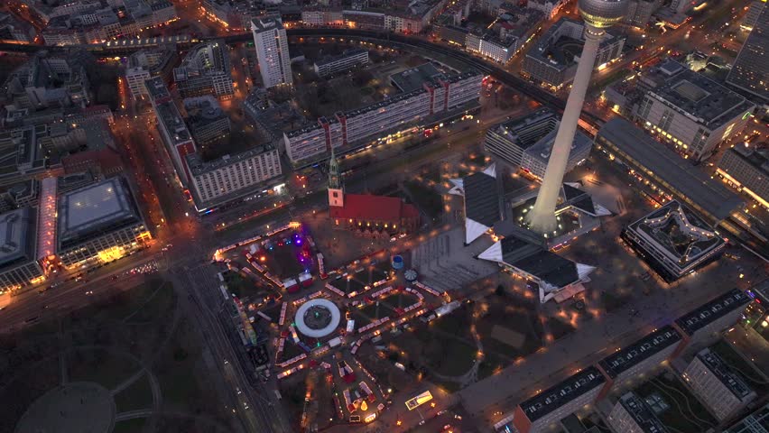 Christmas market in Berlin, Germany, Alexanderplatz at Winter Night, Aerial. Illuminated Weihnachtsmarkt in Berlin-mitte