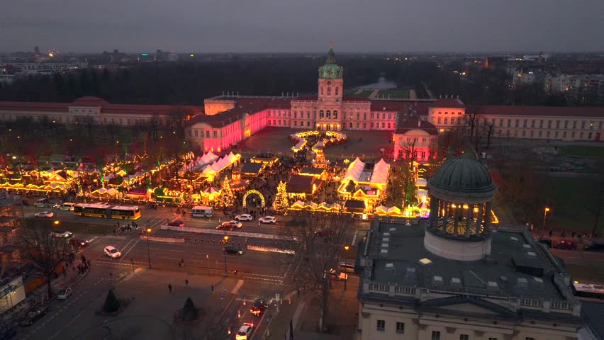 Weihnachtsmarkt Aerial View at Winter Night. Illuminated Christmas market at Charlottenburg Palace in Berlin, Germany