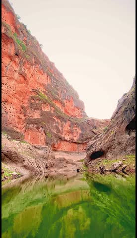 Vertical Canyon River with Small Boat and Rock Cliffs
High-quality vertical photo of a calm river flowing through a rocky canyon with a small boat on the water.
Natural rock formations, green reflections, and peaceful outdoor atmosphere.
Perfect for nature concepts, adventure themes, river landscapes, and mobile backgrounds.
No people, no logos, no text.
