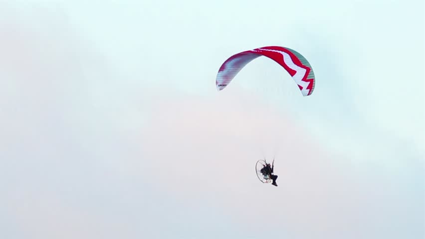 paraglider with a motor in the sky