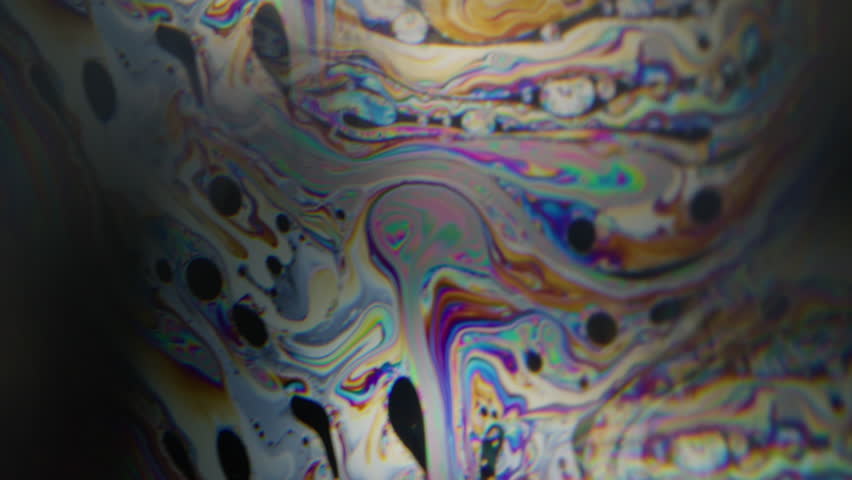 Luminous fluid. Ink stream blur. Colorful dye blend in water gasoline. Rainbow fizz pigment light kaleidoscope effect abstract background.