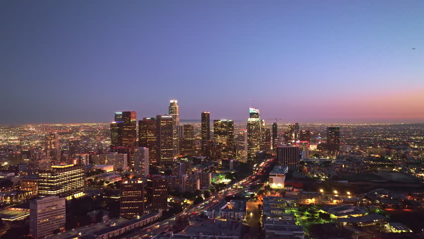 Downtown Los Angeles lights. LA skyline with city lights. Los Angeles skyscrapers at night. Los Angeles night cityscape from drone. LA night cityscape video. Los Angeles city lights.