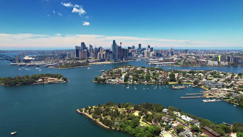 Harbor Scene Overview, City Shoreline With Boats And Sky, Vast Harbor View With Islands And Distant Skyline