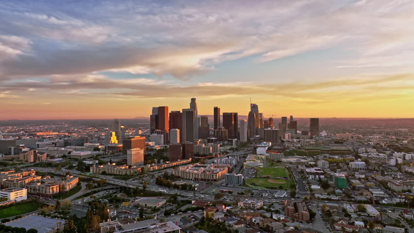 Los Angeles downtown aerial panorama. Los Angeles downtown at night. Los Angeles skyline, night urban skyscrapers. LA at dusk. Evening in Los Angeles city, LA architecture.