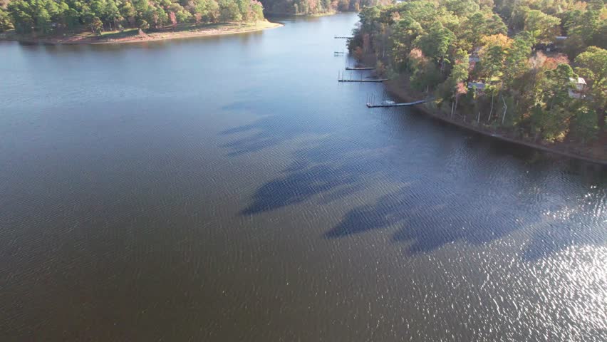 Aerial footage of docks along the shore on the Lake O