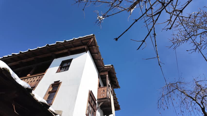 Winter view of Village of Leshten with Authentic nineteenth century houses, Blagoevgrad Region, Bulgaria