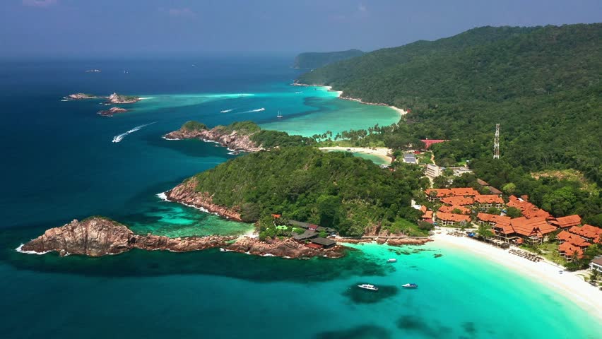 Aerial view of Long beach and the coastal area of Redang Island on a sunny day. A tropical paradise beach and resort on the island. Malaysia