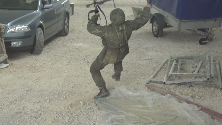 Soldier falling down in slow motion