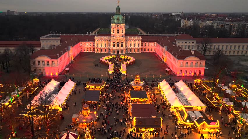 Weihnachtsmarkt Aerial View at Winter Night. Illuminated Christmas market at Charlottenburg Palace in Berlin, Germany