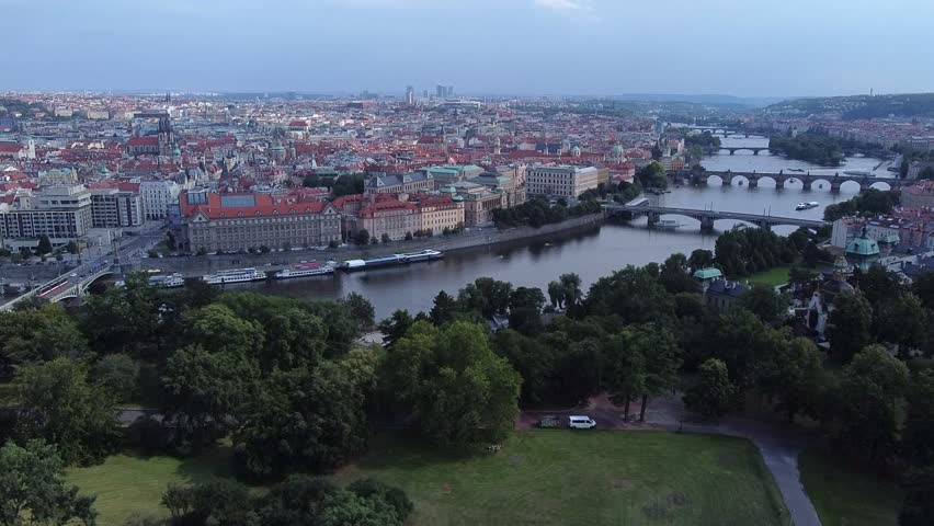 Aerial view of Prague city skyline and Vltava River with multiple bridges