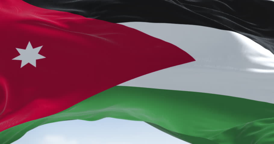 Jordan national flag waving in the wind. Black, white, and green horizontal stripes with a red chevron on the left housing a white seven-pointed star. Seamless 3d render animation. Slow motion loop