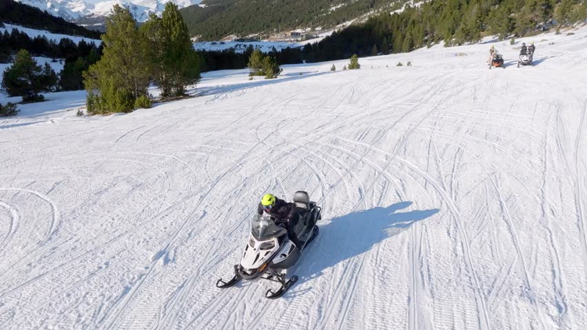 A snowmobile filmed with a drone, Grandvalira Andorra