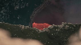 4K Cinematic Video of Fiery Lava Flowing in a Volcanic Crater - High Res UHD Footage Capturing the Intense Heat and Natural Power of Erupting Magma, Perfect for Nature Documentaries and Educational Projects - Powered by Shutterstock - Get 15% off with code: PIKWIZARD15