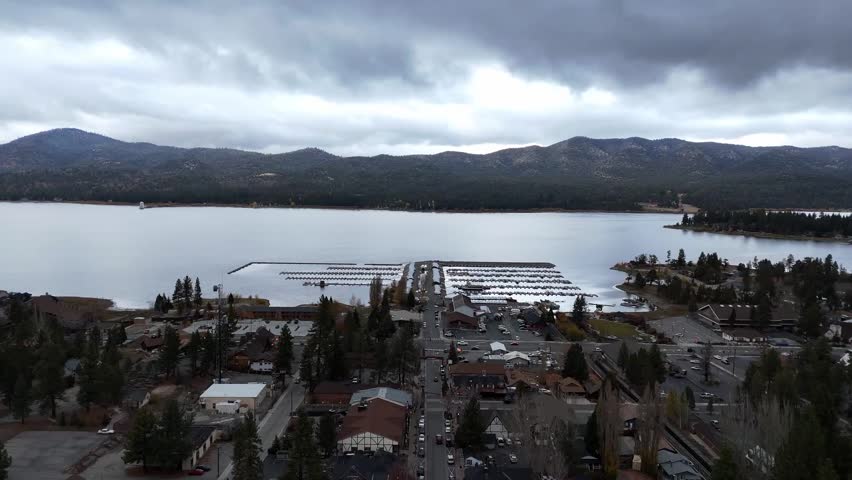 Wide scenic view establishing Big Bear Lake CA as a mountain boating destination.