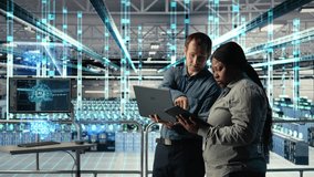 Engineering team in data center uses AR simulation to visualize AI systems, VFX compositing concept. Teamworking server farm colleagues oversee deep learning equipment using digital twin visualization - Powered by Shutterstock - Get 15% off with code: PIKWIZARD15