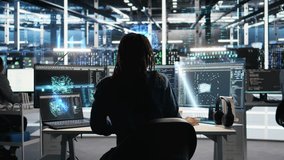 Programmer in data center using holographic simulation to visualize AI LLM with VFX HUDs. IT specialist in server hub oversees artificial intelligence infrastructure using digital twin visualization - Powered by Shutterstock - Get 15% off with code: PIKWIZARD15