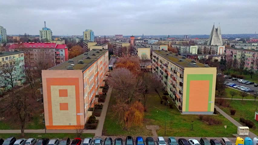 Aerial panorama of residential district in Kalisz with dynamic hyperlapse drone flight over apartment blocks city center