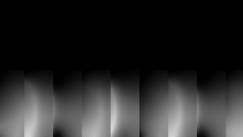 Monochrome waves of grey and white light create a soft and smokey texture that moves across the bottom of the frame in a calm rhythmic pattern