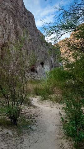 Hiking a Sandy Trail Under Giant Cliffs (Big Bend National Park, Texas, USA)