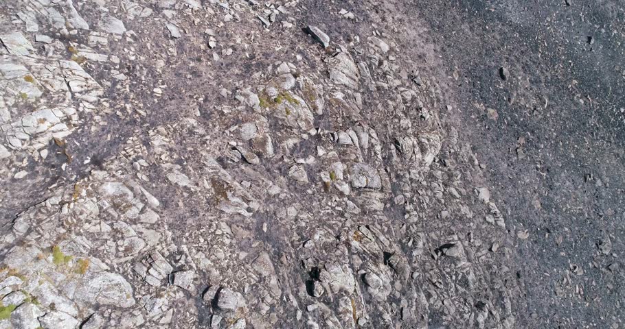 Drone Shot of Stony Hillside with Scrub Vegetation The Concept of Wild Nature