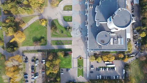 Drone Advancing over Park Building Complex