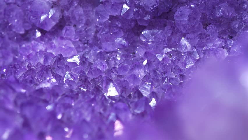 Stones and minerals, riches of Earth. methyst - mineral of quartz group. Natural amethyst crystal geode. Purple amethyst geode - small cavity in rock lined with crystals or other mineral matter