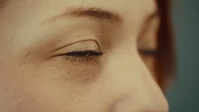 Slow motion macro of a female eye opening and blinking, a sense of awakening, attention and focus, vision and beauty concept. - Powered by Shutterstock - Get 15% off with code: PIKWIZARD15