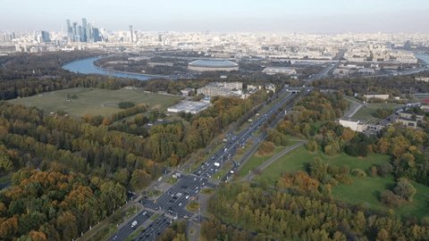 Drone Descending Upward Tilt over City Park