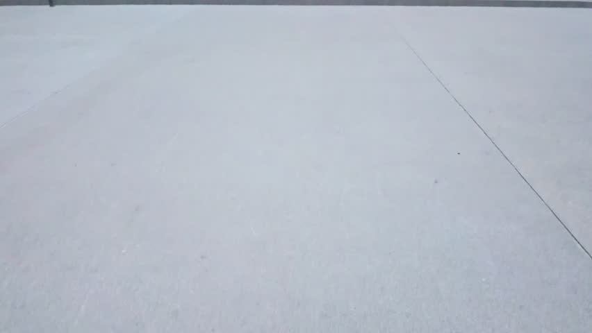 Neoclassical architectural facade of the California State Capitol building featuring the iconic white dome and grand columns under a clear sky