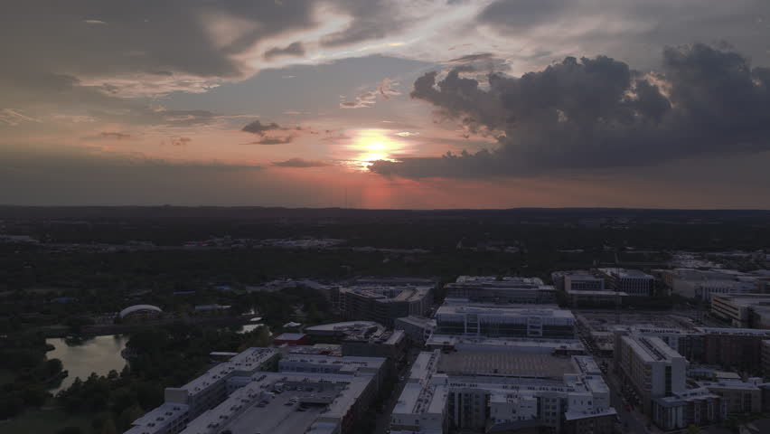 Drone Reveals Downtown Austin Skyline at Sunset Over Mueller Lake (Part 2)