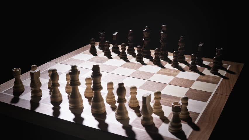Minimal Close-up of Chessboard with Pieces Arranged in Focus Under Dramatic Light Symbolizing Logic, Strategy, and Foresight - an Abstract Vision of Leadership, Discipline, and Intelligent Planning