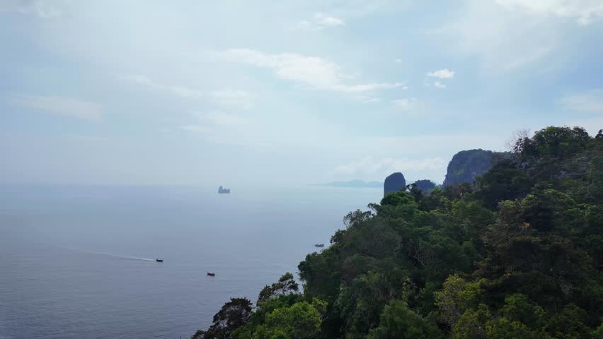 Hong Island viewpoint Andaman Sea Thailand limestone cliff landscape rainy season Southeast Asia