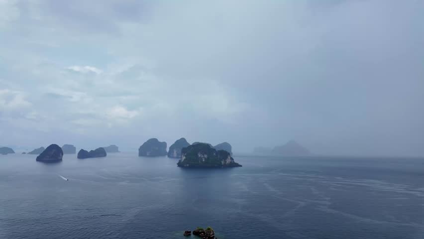 Hong Island viewpoint Andaman Sea Thailand limestone cliff landscape rainy season Southeast Asia