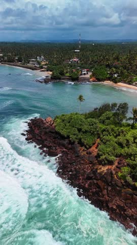 Coconut Tree Hill famous scenic spot in Mirissa, Sri Lanka aerial drone holiday destination